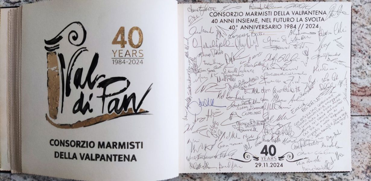 Open book with logo of the Consorzio Marmisti della Valpantena and signatures