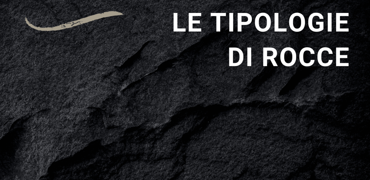 Porzione di roccia nera, sulla quale è indicato il titolo "Le tipologie di rocce"